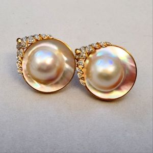 Mabe pearl, 14k yellow gold and diamond earrings. French clips.